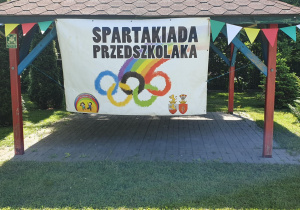 baner z napisem Spartakiada Przedszkolaka